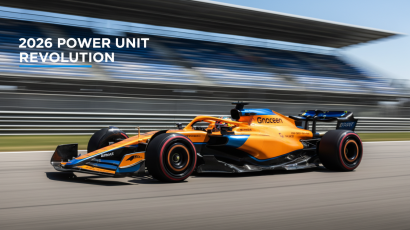 A bright 16:9 minimalist shot of a 2026 McLaren F1 car in papaya orange on a sun-drenched track, representing the new power unit era.